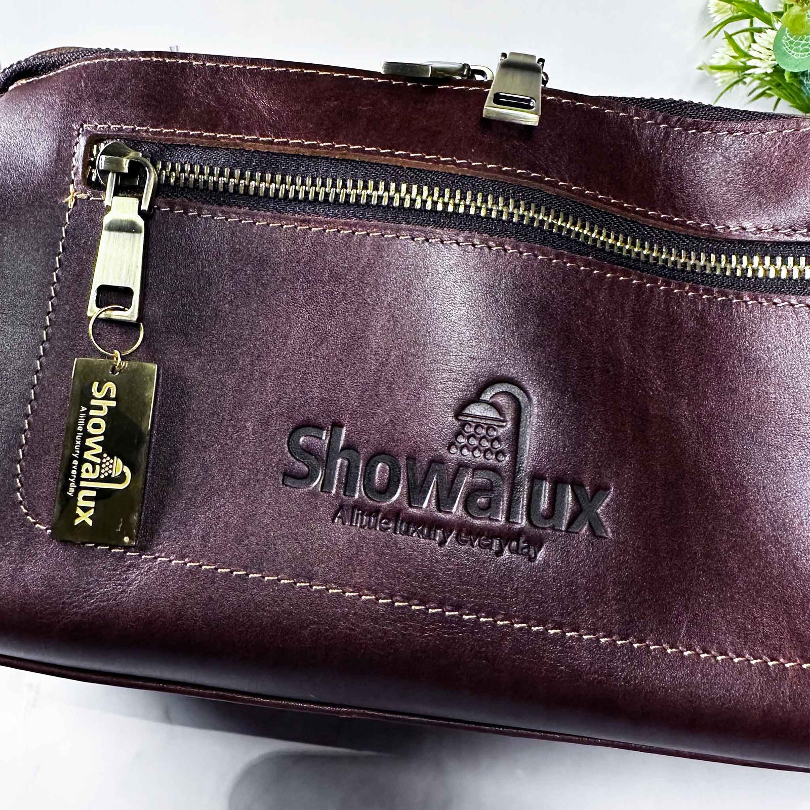 Showalux leather bag with visible branding on a light background