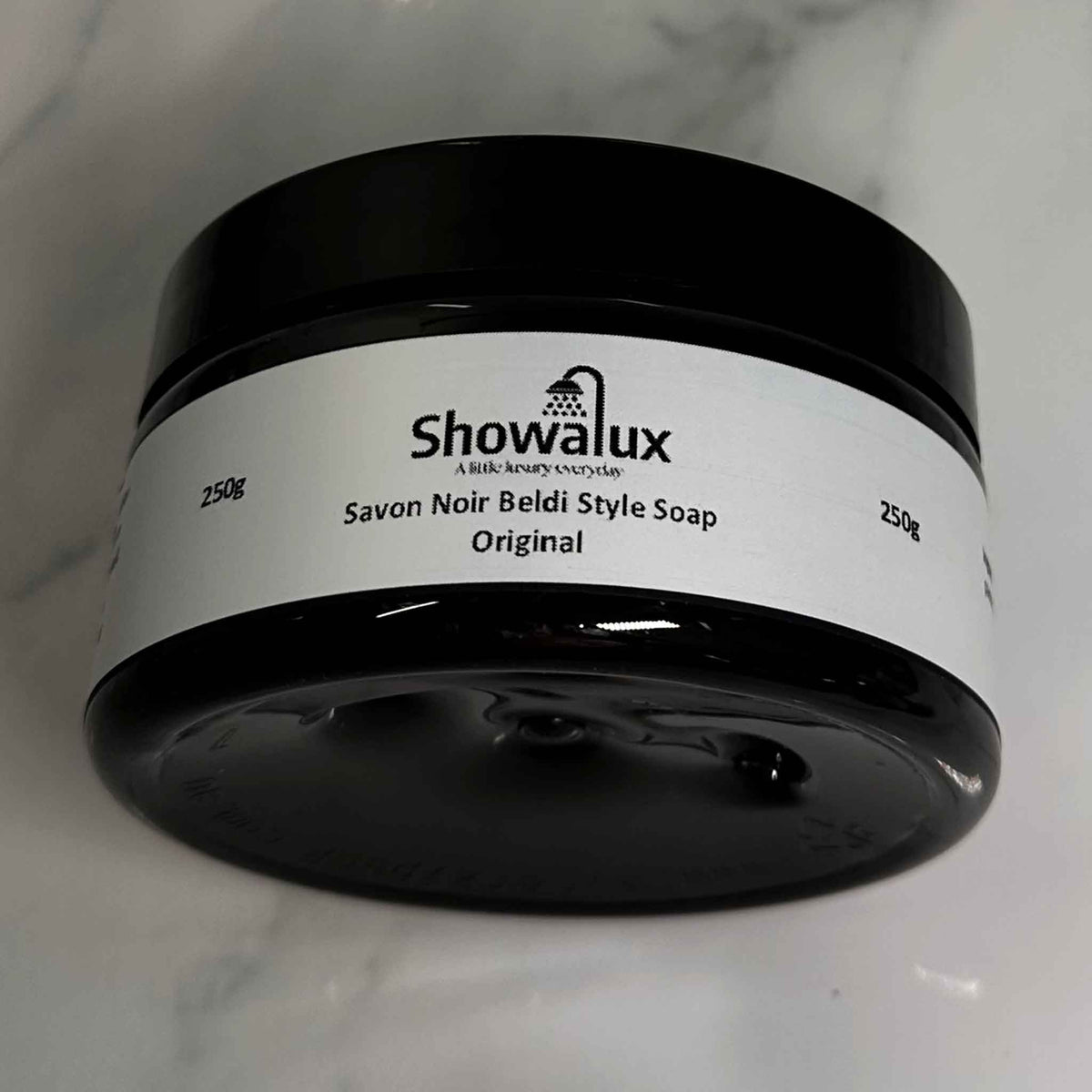 Side view of Beldi Soap jar displaying the name and weight