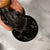 Beldi soap paste on fingers over a jar