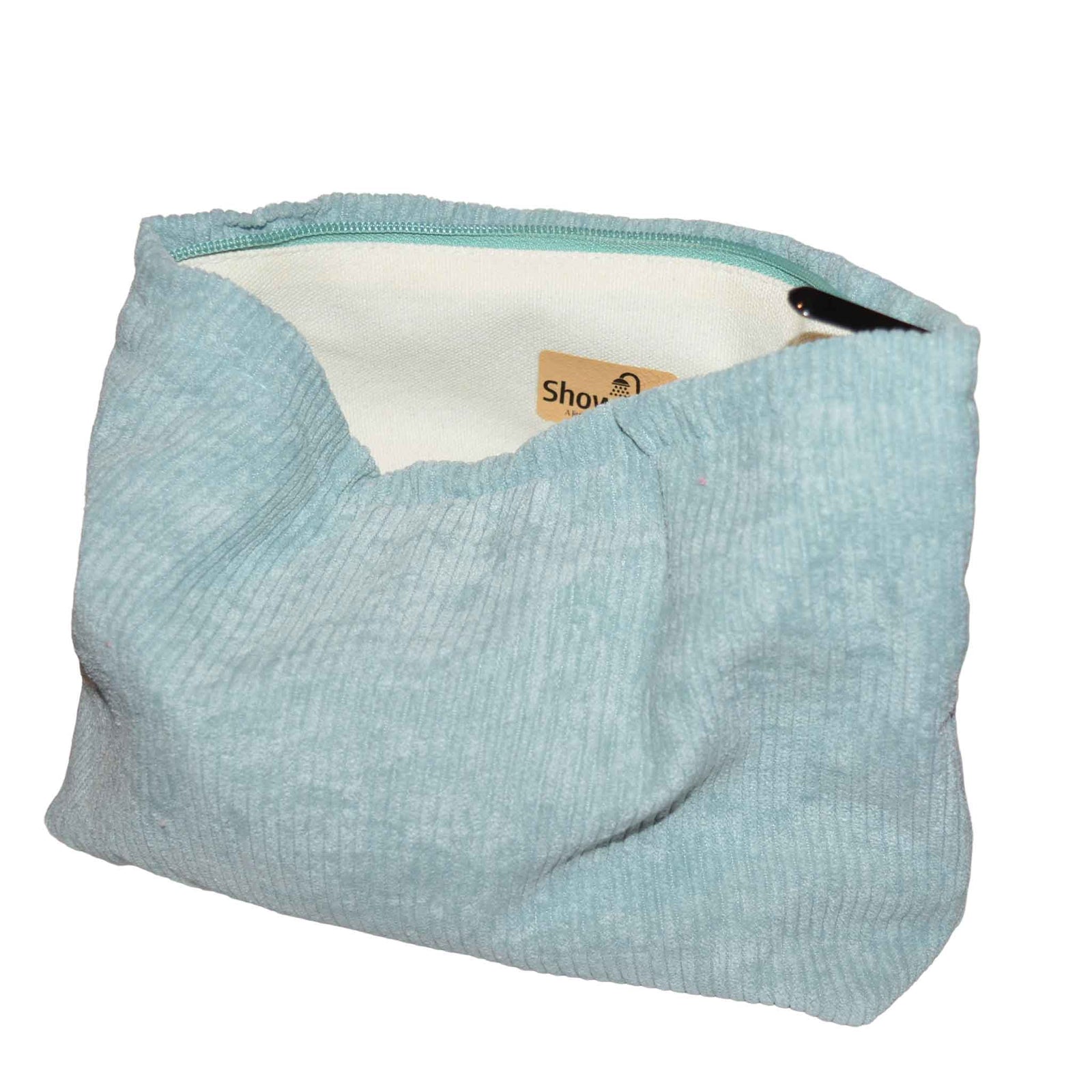 Blue corduroy bag open partially showing the Showalux logo