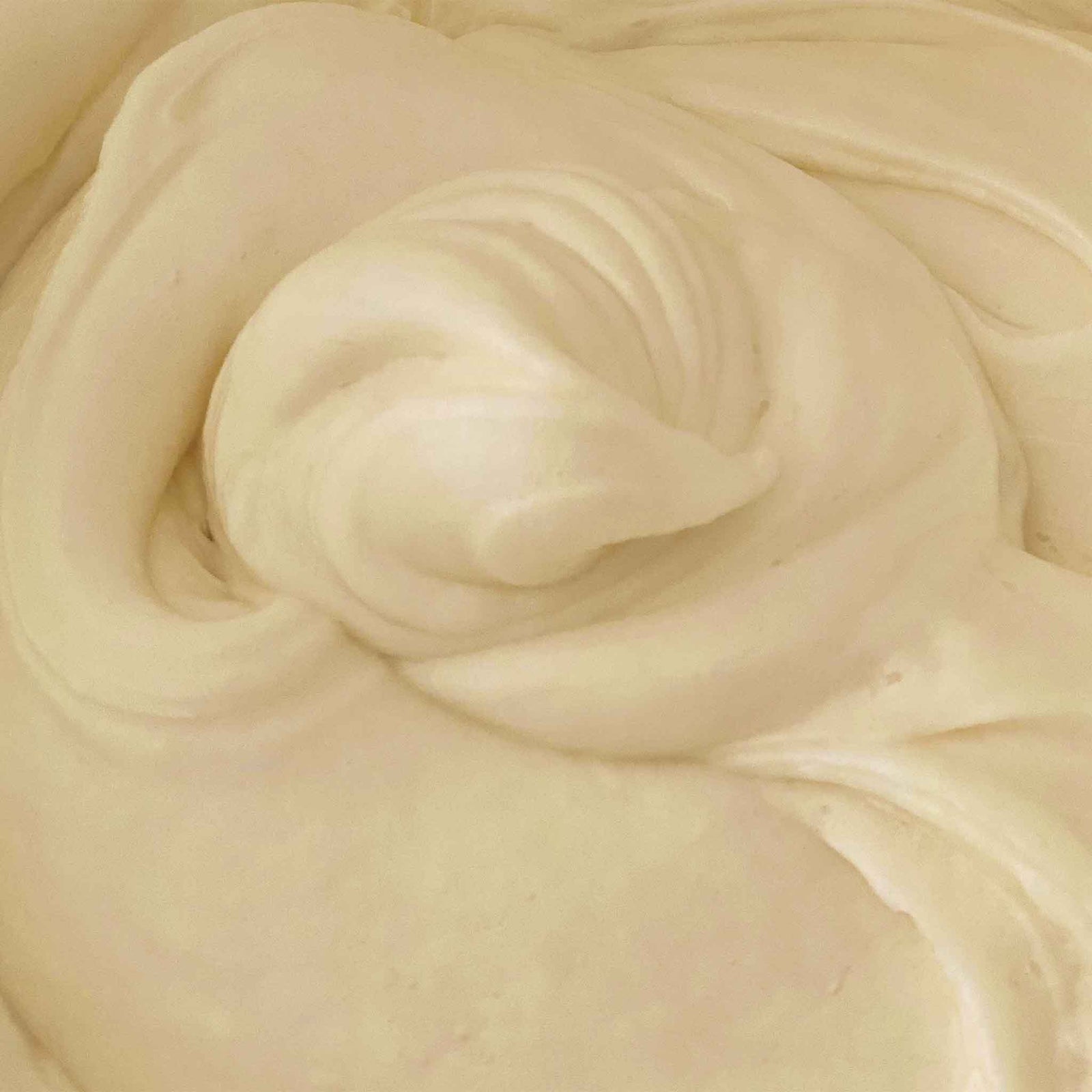 Close-up of creamy beige swirled soap