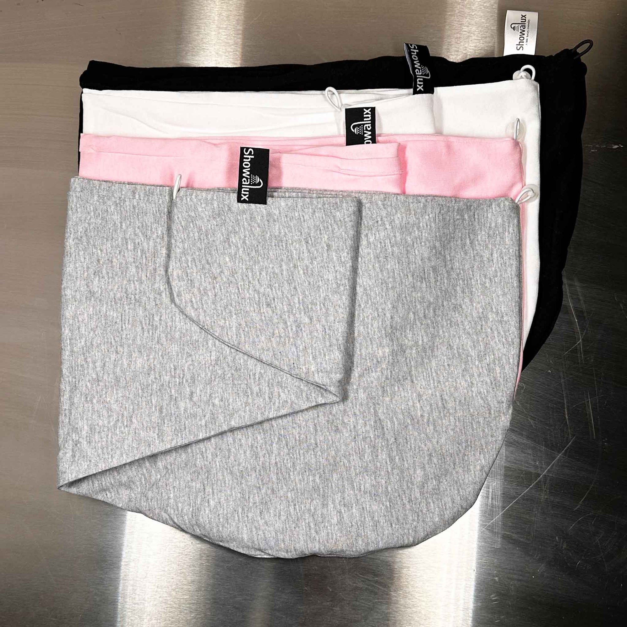 Shows the 4 colours of the cotton wraps with the showalux logo showing for each colour