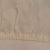 shows a hand mitten type of glove that is made out of off white raw silk with a cotton band on a background of a light blue towel