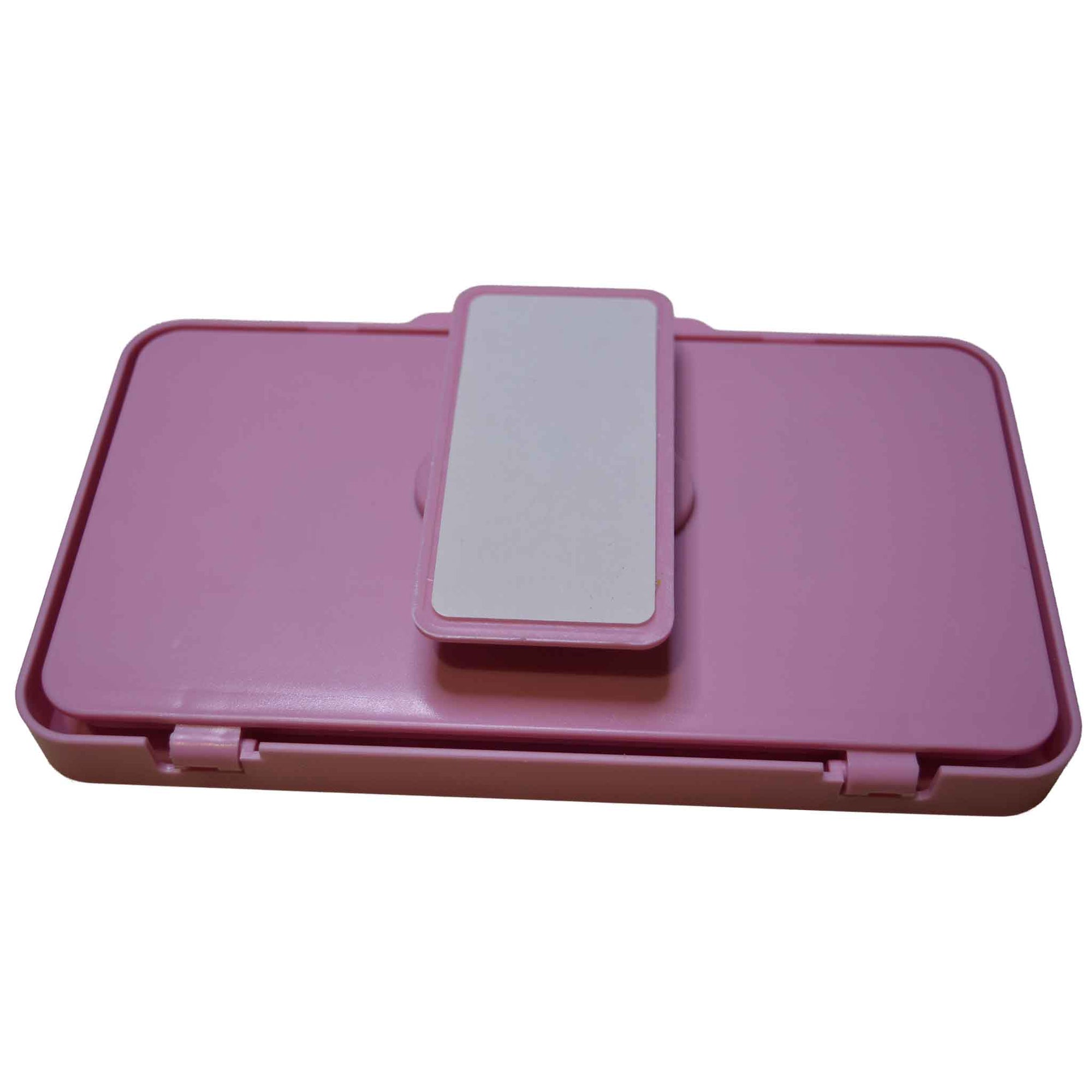 Pink phone holder back side up showing the base that sticks to the wall