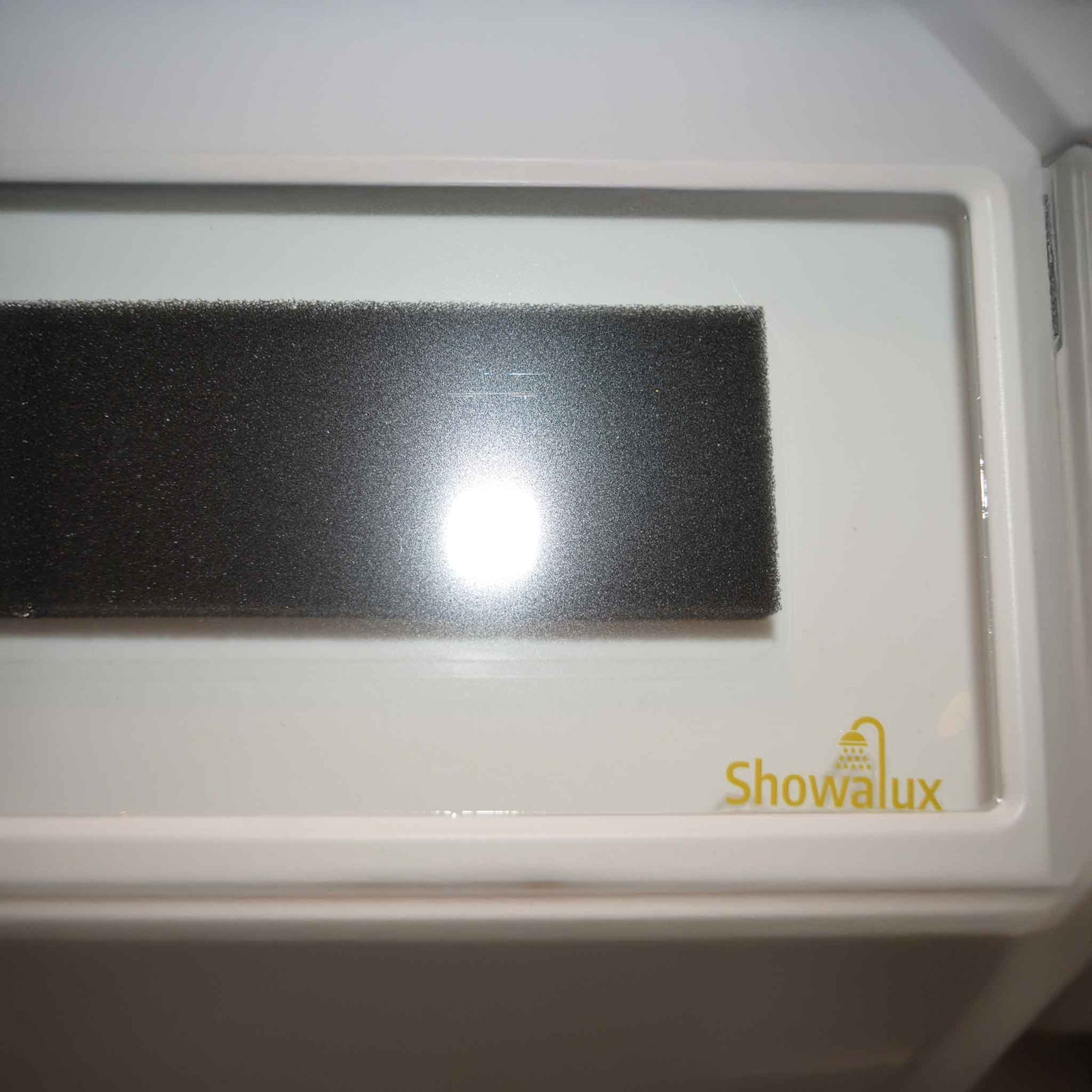 White Phone holder empty inside showing the foam backing