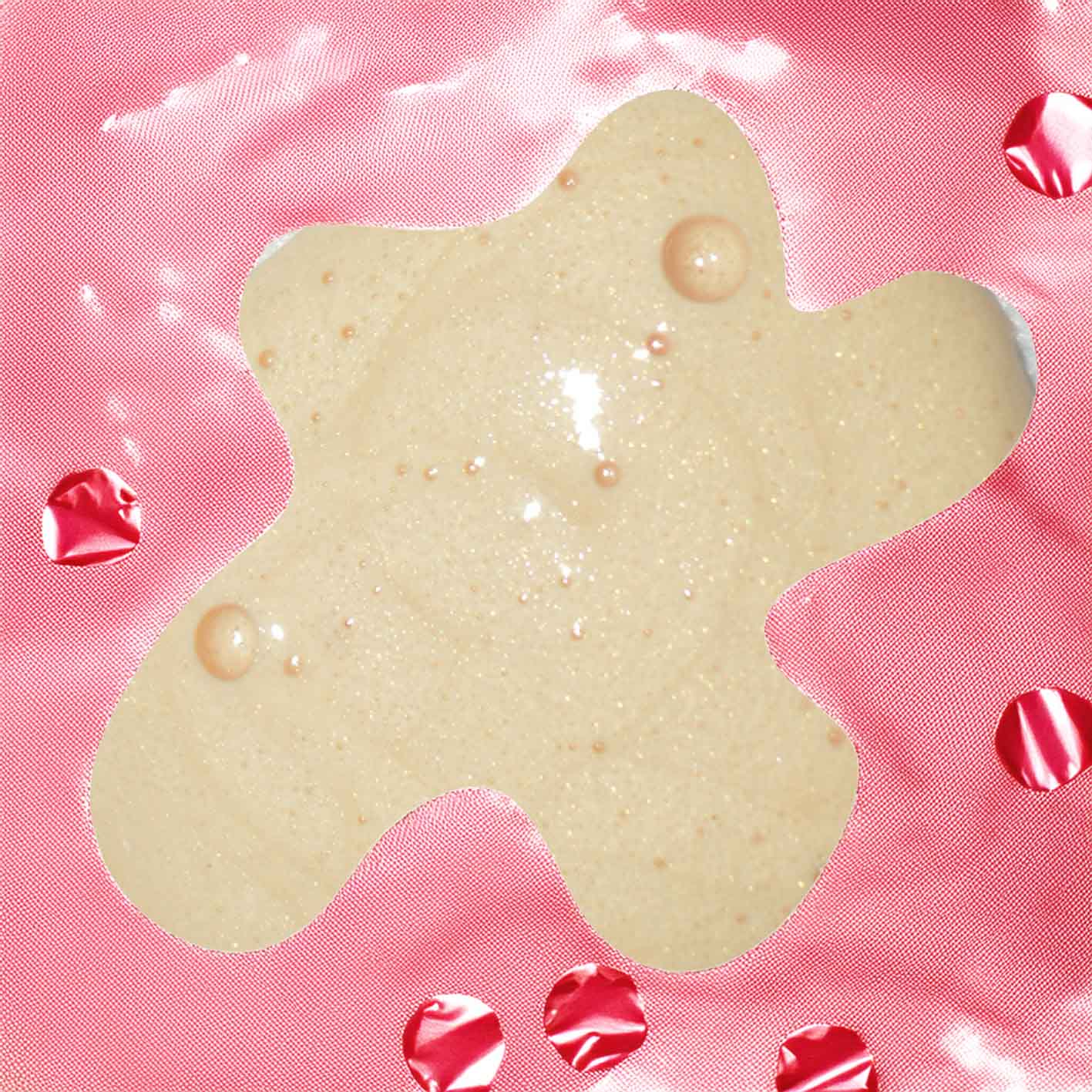 Star-shaped cream soap dough on a pink background with red decorative elements