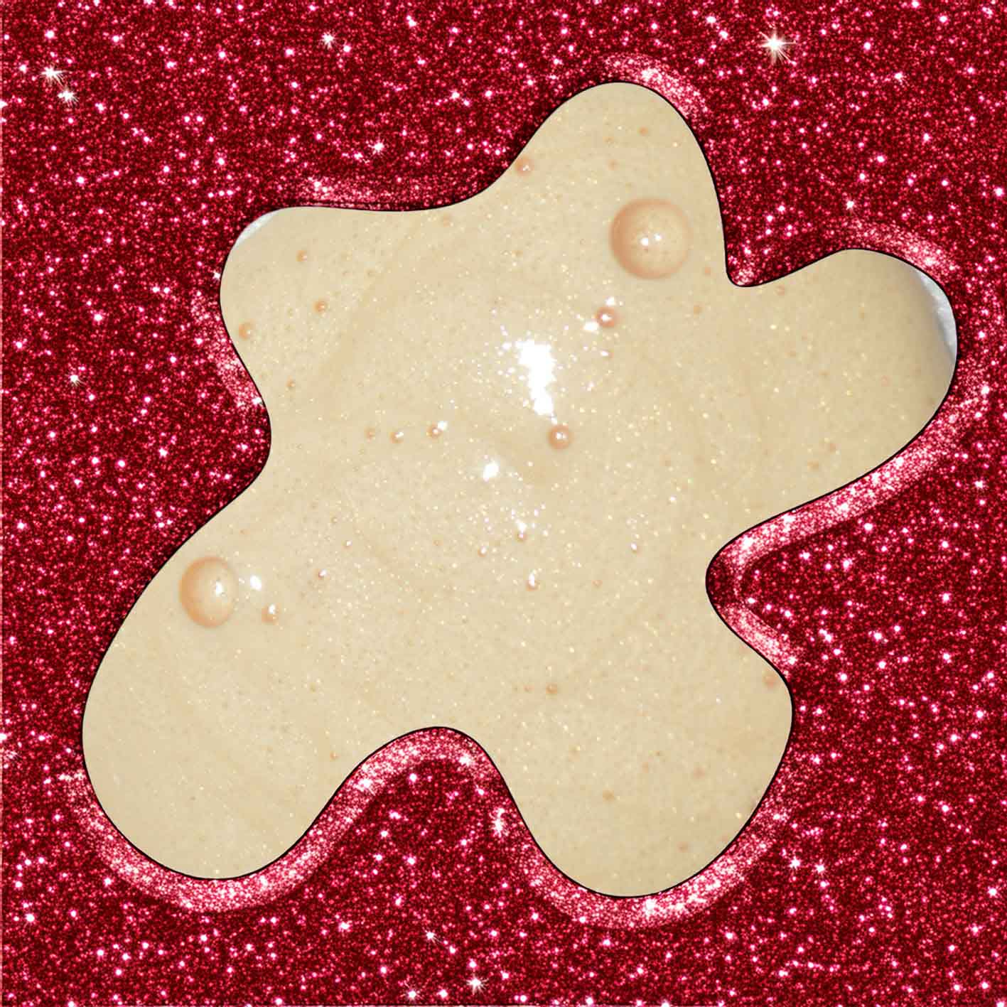 Star-shaped cream soap on a red glittery background