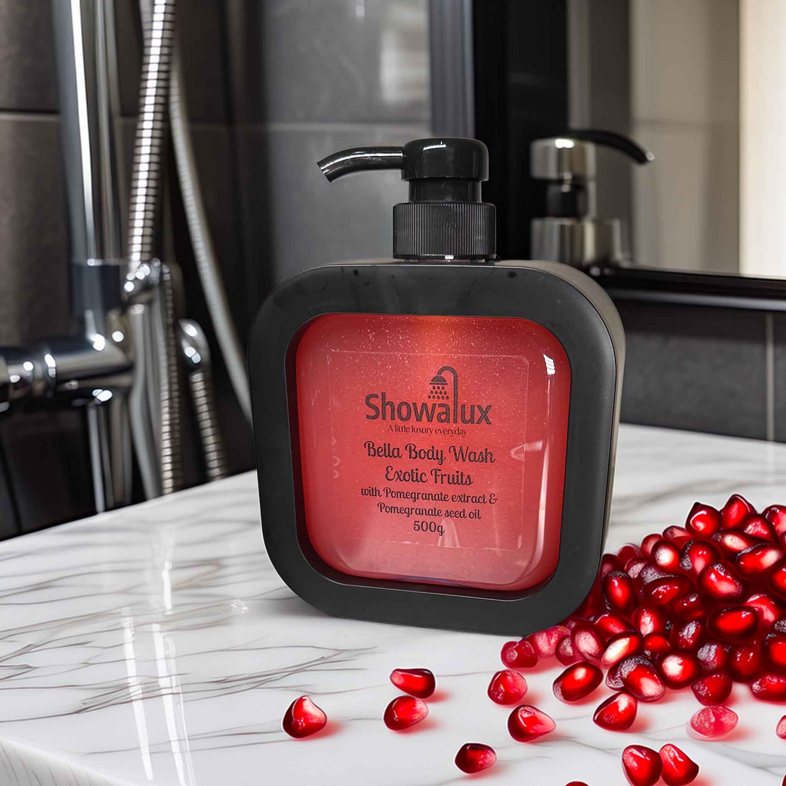 Showalux Bella Body Wash bottle with pomegranate seeds on a bathroom counter